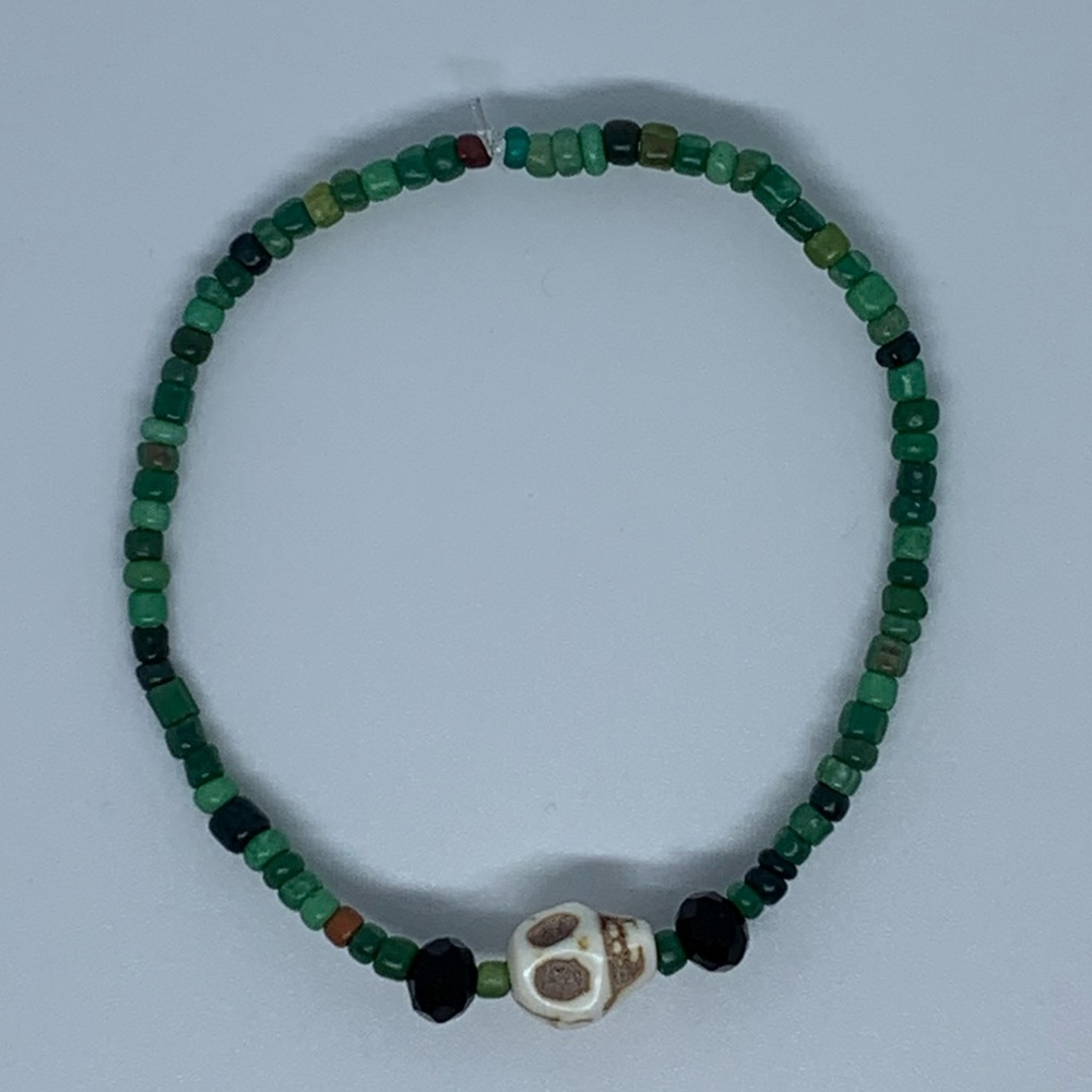 White Howlite Skull Green Beaded Bracelet